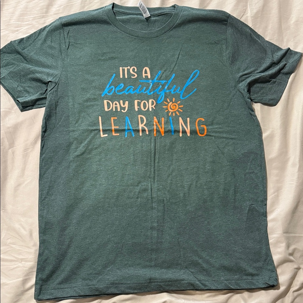 Green Graphic T-Shirt with Colorful Text